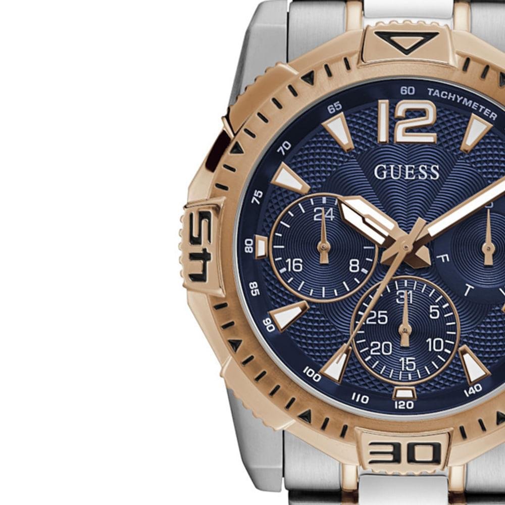 Guess Orologio Uomo GW0056G5 - Cassa In Acciaio Oro Rosa, Quadrante Blu Con Funzioni Giorno, Data E 24H, Bracciale In Acciaio, 190mm