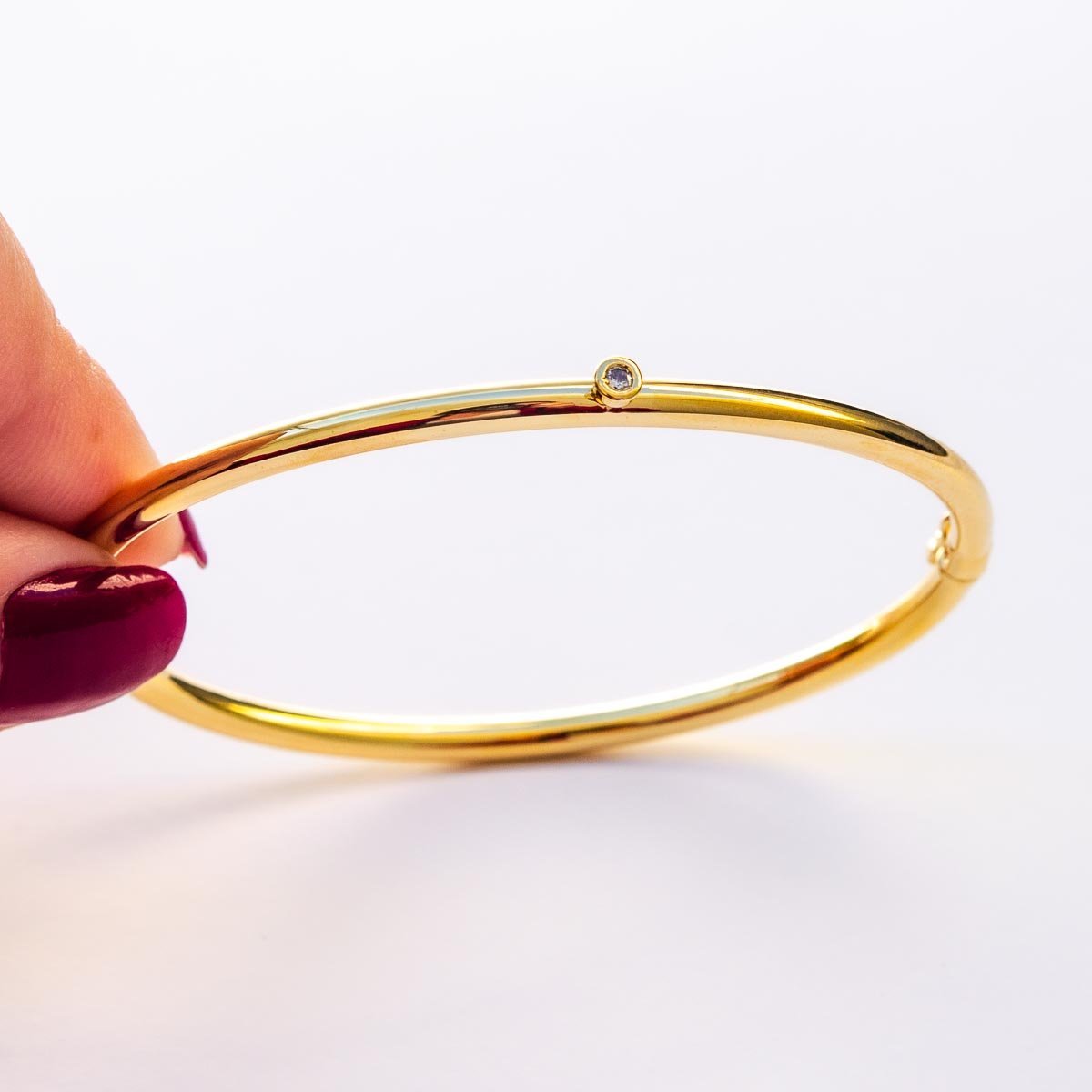 Bracelete Liso com Ponto de Luz Banhado a Ouro 18k Dourado 2