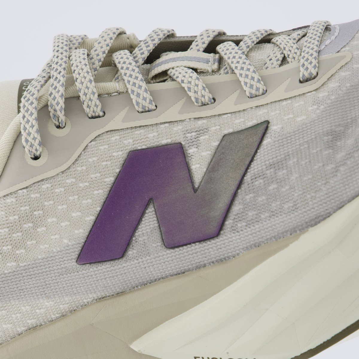 Tênis New Balance Fuelcell Rebel V5 Feminino Cinza e Roxo Bege 7