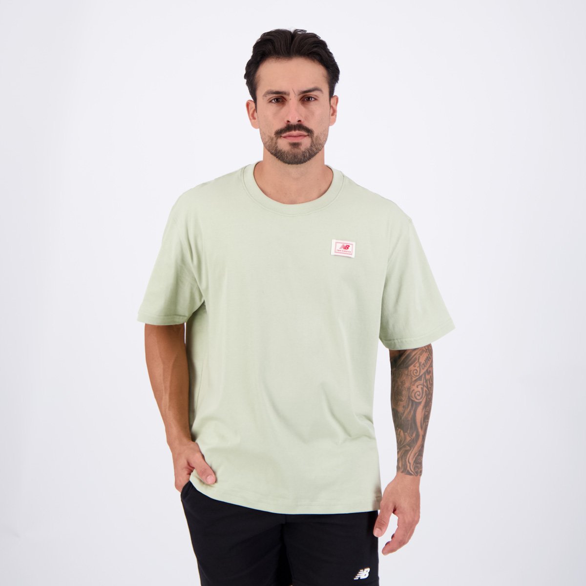Camisa New Balance Woven Label Verde