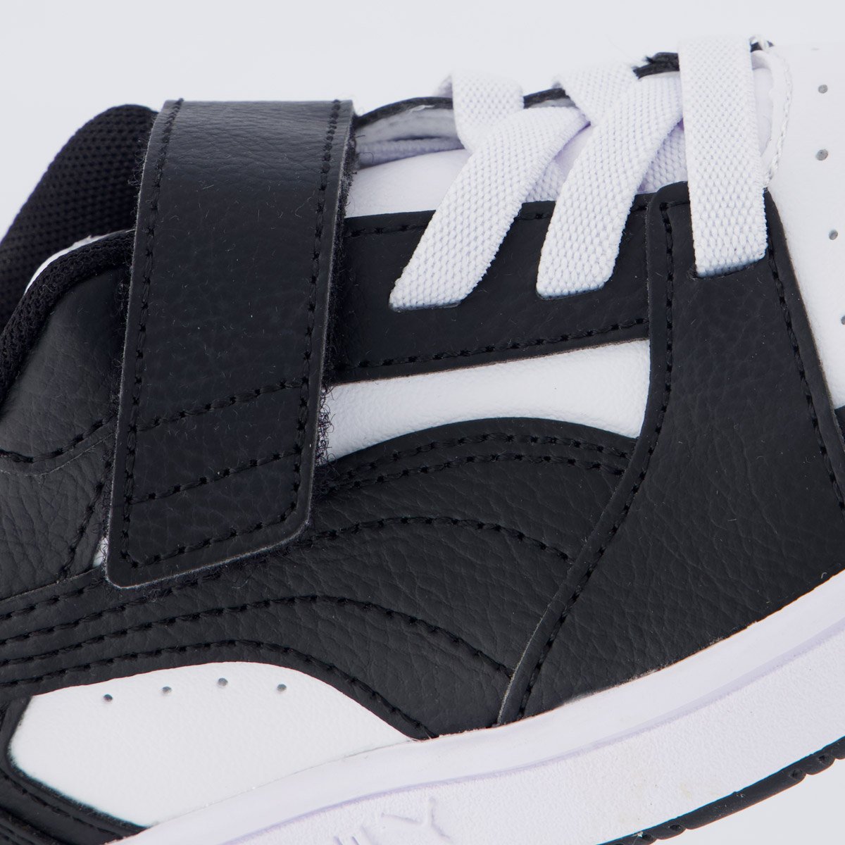 Tênis Puma Rebound V6 LO Juvenil Branco e Preto Preto/Branco 7