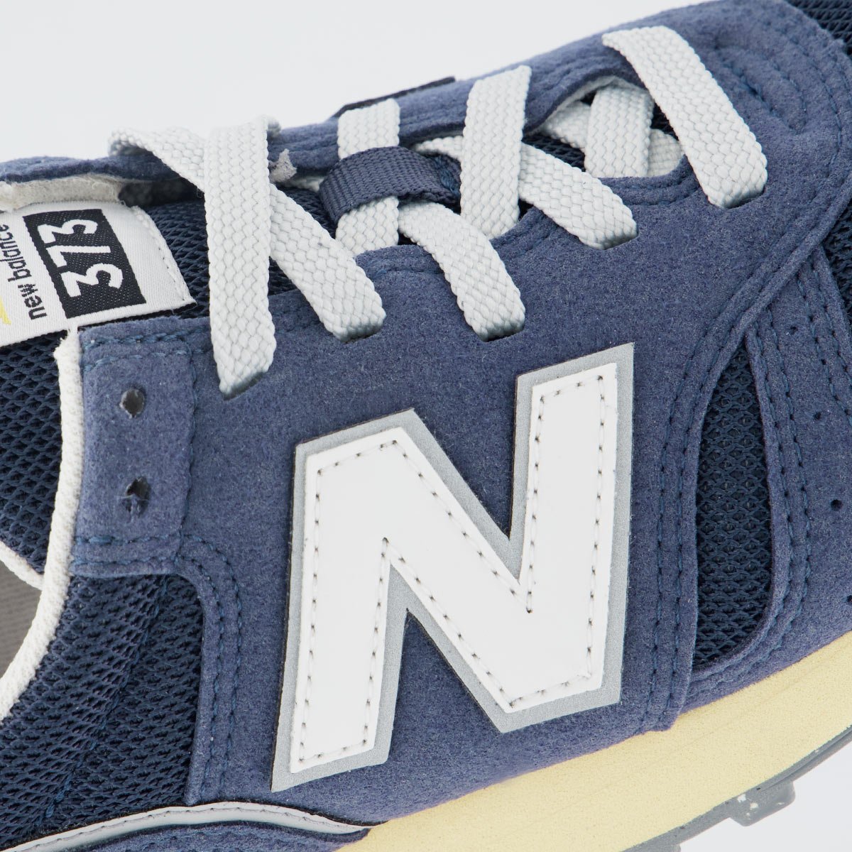 Tênis New Balance 373 V2 Feminino Marinho e Branco Azul 7