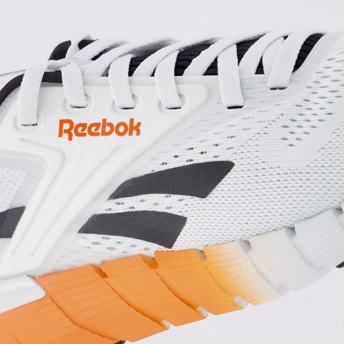 Tênis Reebok Nano Gym Branco e Laranja Branco/Laranja 2
