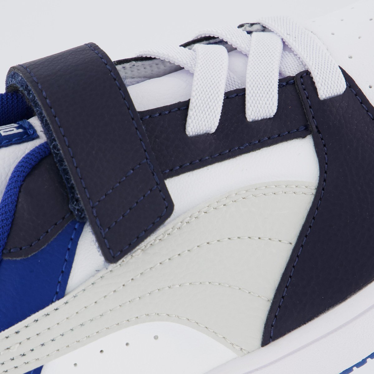 Tênis Puma Rebound V6 LO AC+ PS Juvenil Branco e Azul Marinho Branco 7
