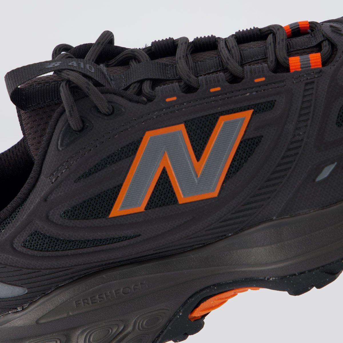 Tênis New Balance 410 V9 Preto e Laranja Preto 7