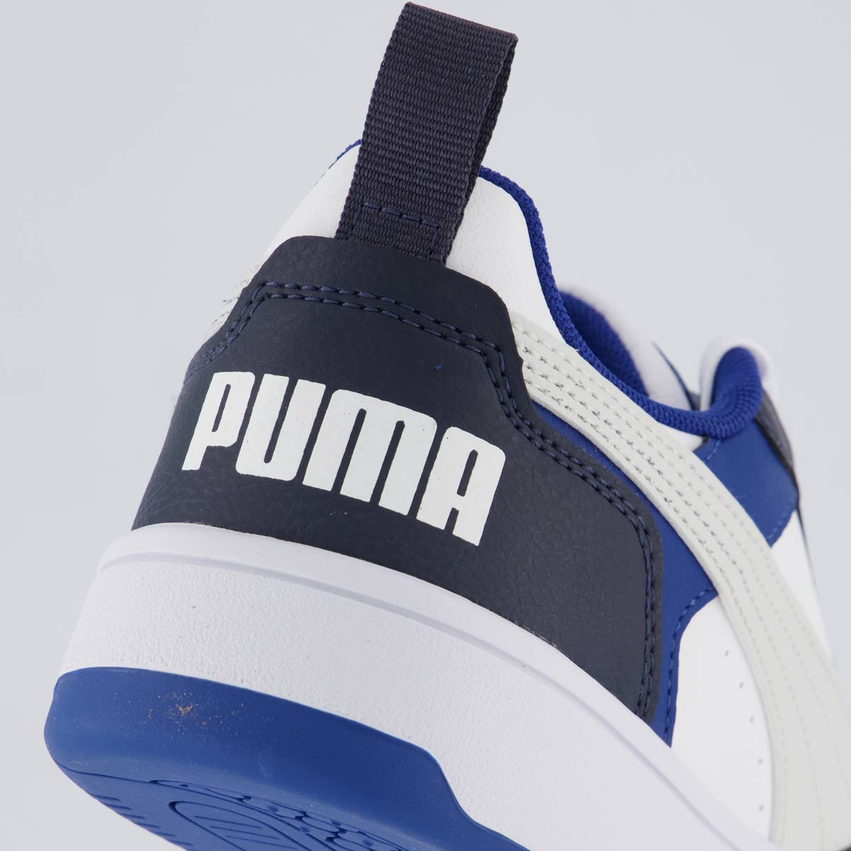 Tênis Puma Rebound V6 LO Juvenil Preto e Azul Branco/Azul 6