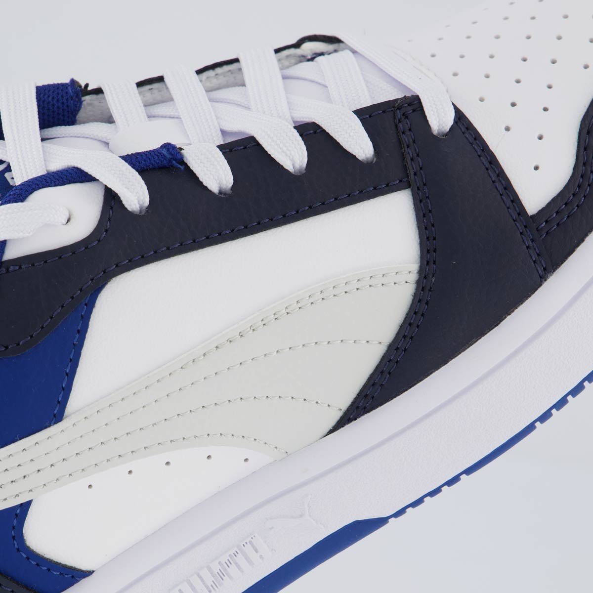 Tênis Puma Rebound V6 LO Juvenil Preto e Azul Branco/Azul 7