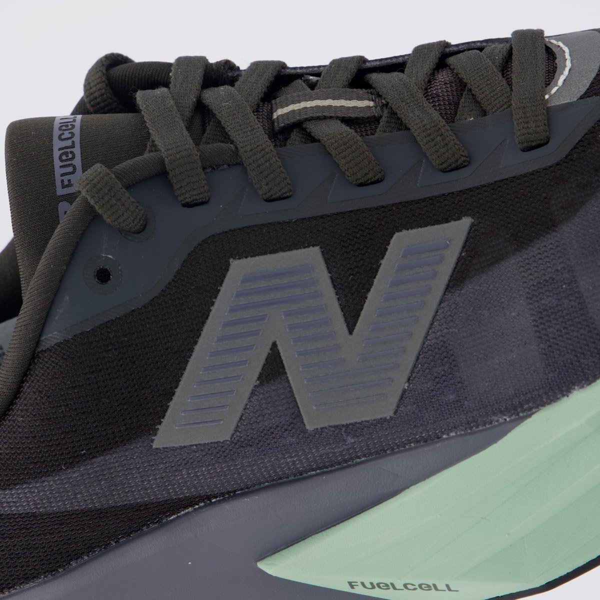 Tênis New Balance Fuelcell Rebel V5 Feminino Preto e Verde Preto 7