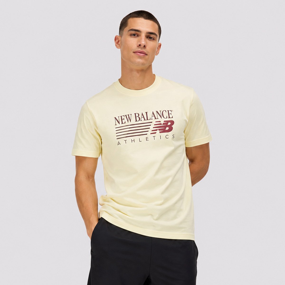 Camiseta New Balance Reimagined Graphic Amarela