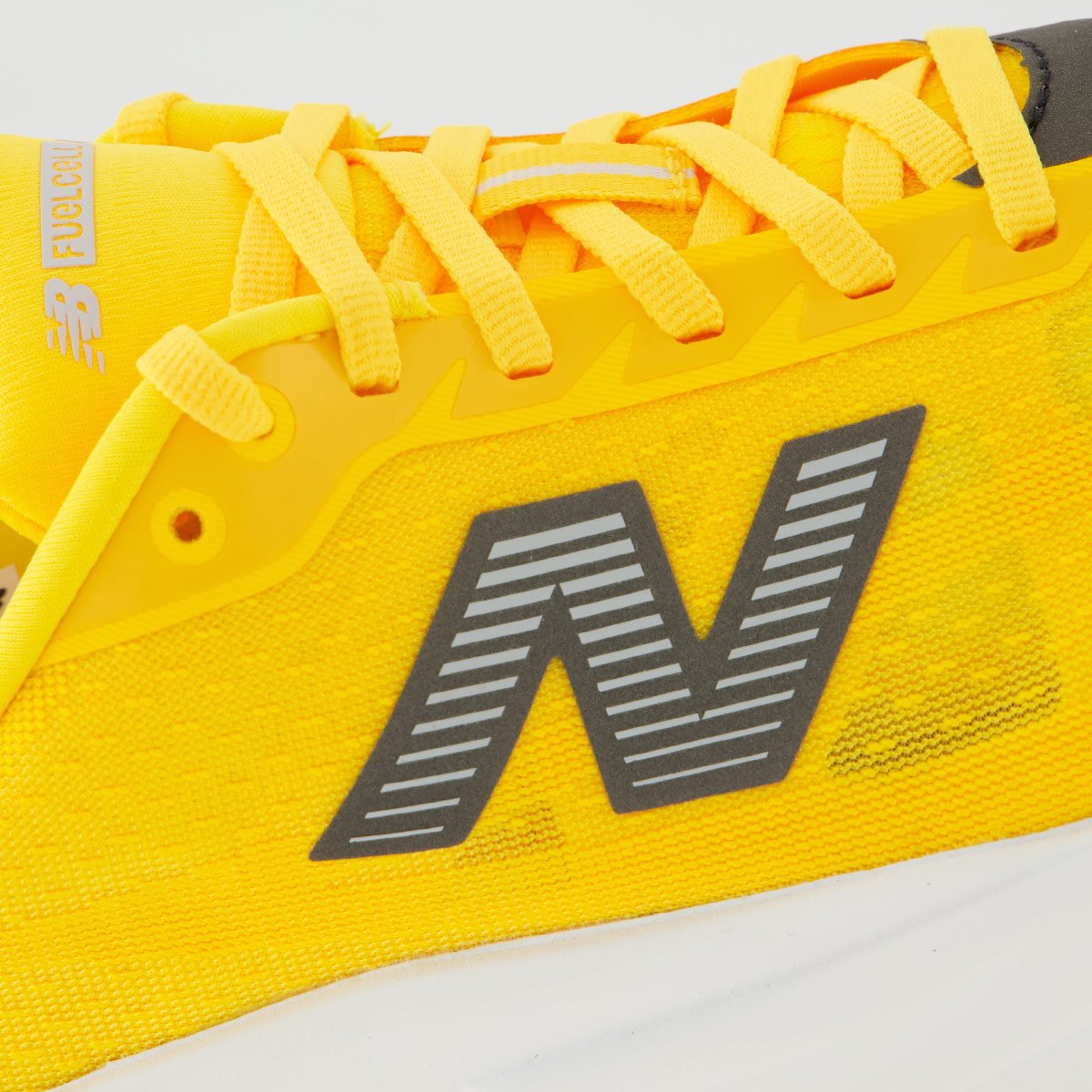 Tênis New Balance Fuelcell Rebel V5 Laranja e Branco Branco 7