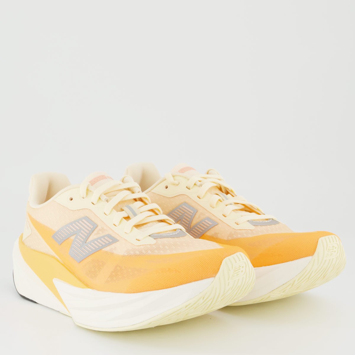 Tênis New Balance Fuelcell Rebel V5 Feminino Laranja e Branco Branco 2