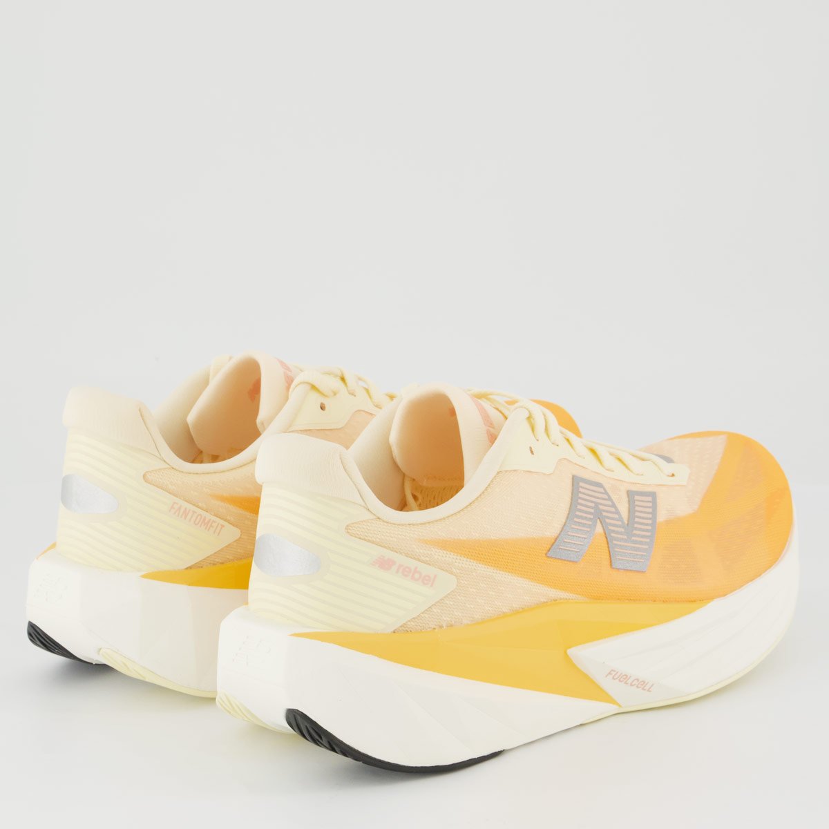 Tênis New Balance Fuelcell Rebel V5 Feminino Laranja e Branco Branco 3