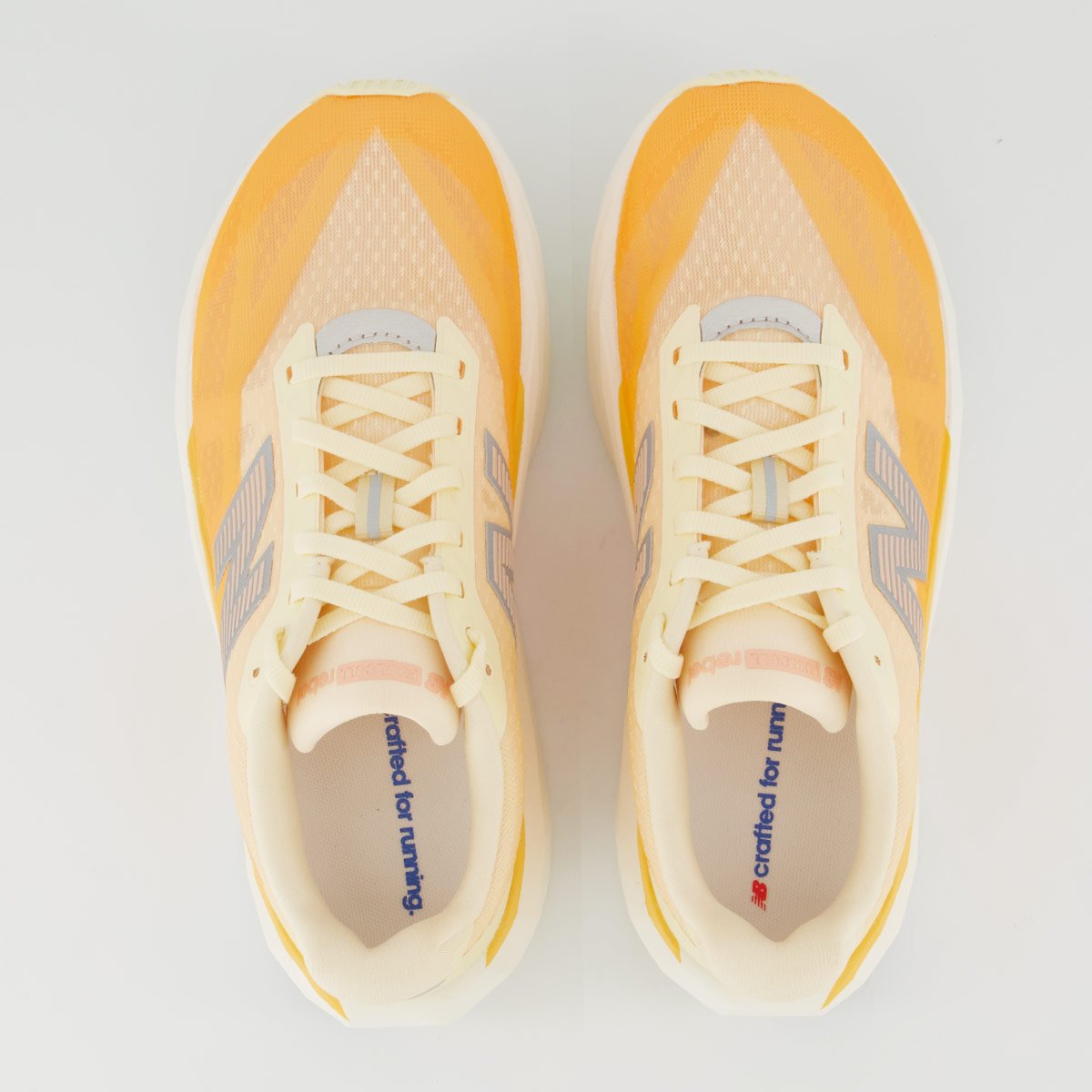 Tênis New Balance Fuelcell Rebel V5 Feminino Laranja e Branco Branco 4