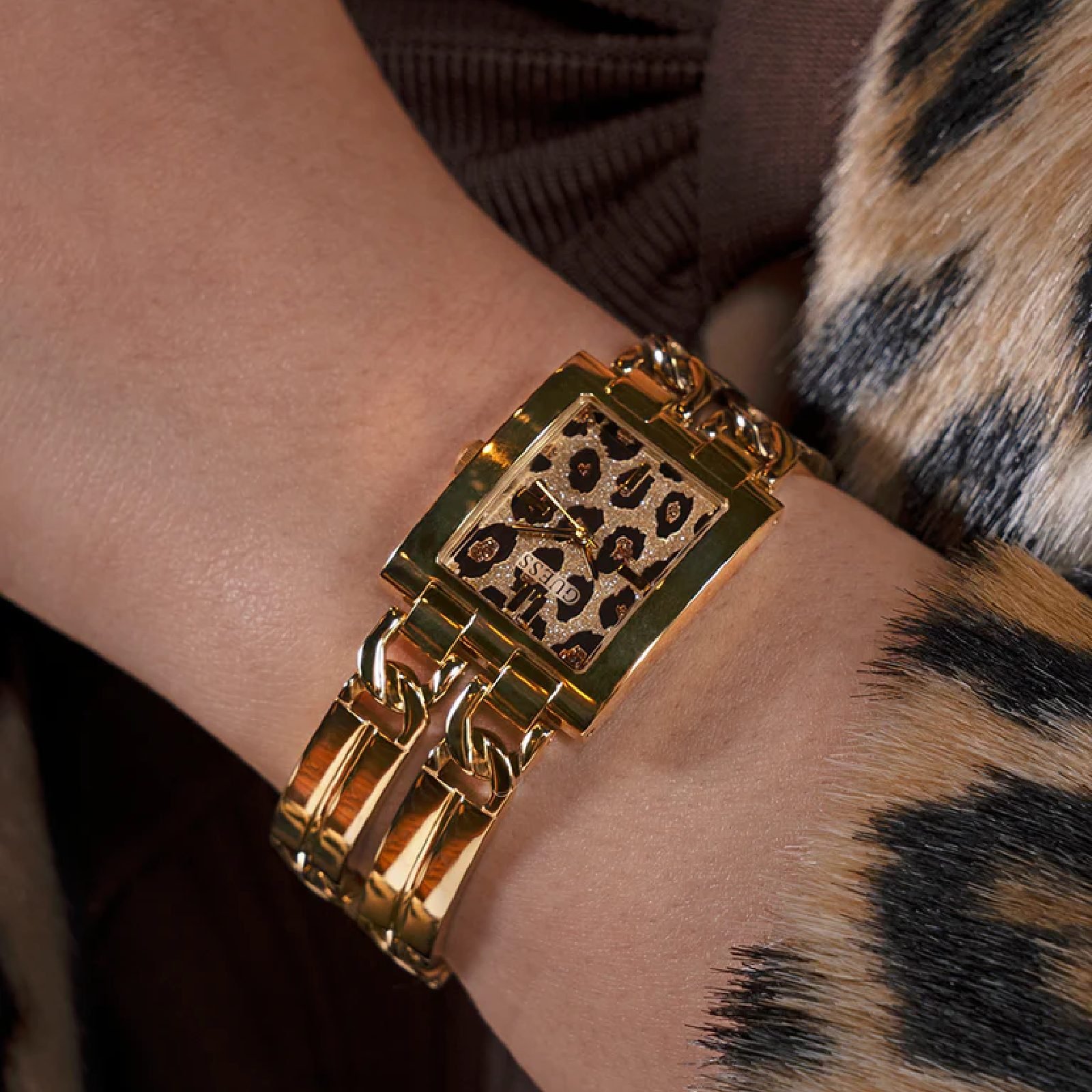 Relógio Guess Feminino Iconic Animal GW0807L2 Dourado 4