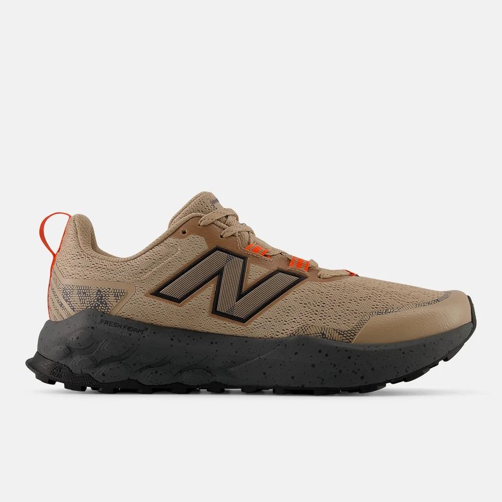 Tênis New Balance Fresh Foam Garoe V2 - masculino - marrom e preto