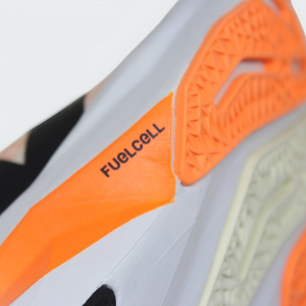 Tenis New Balance Rebel V4 - feminino - branco e laranja Bege 7