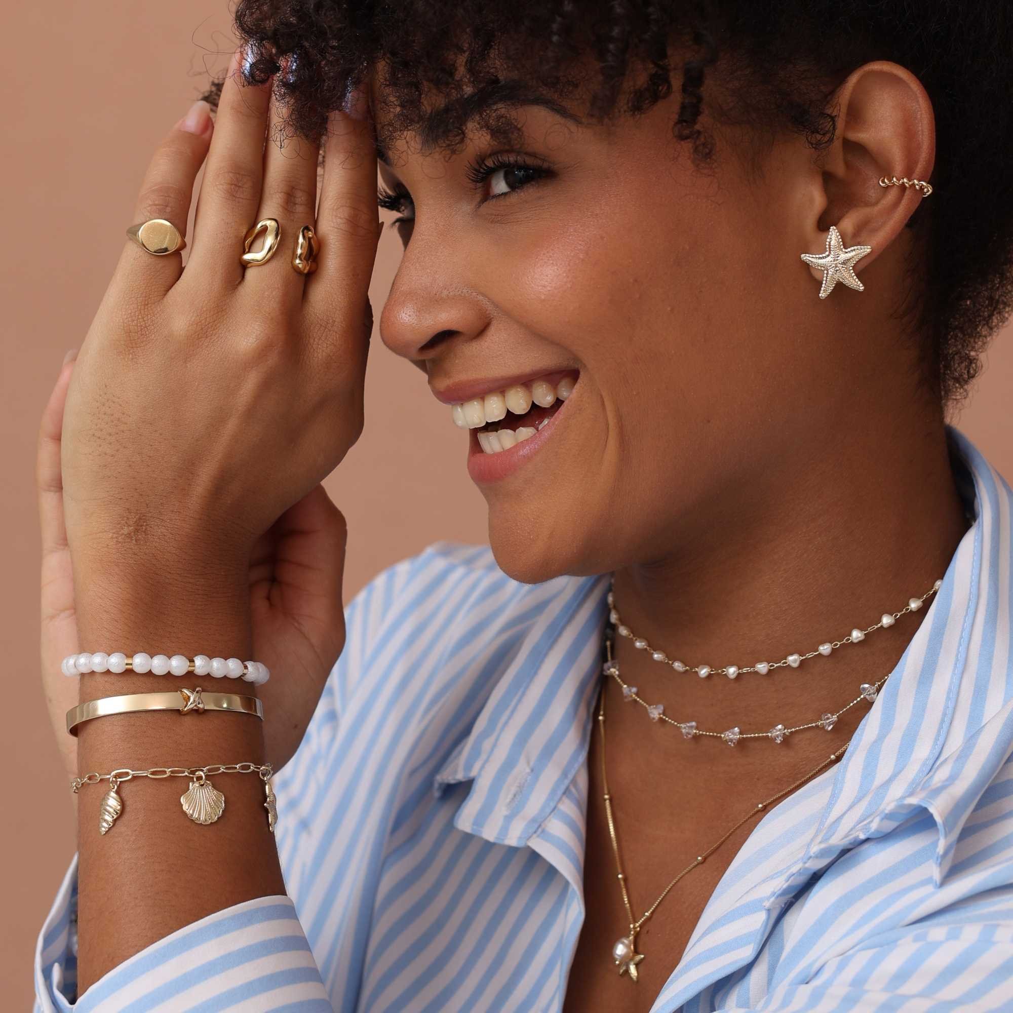 Brinco Folheado a Ouro 18k Estrela do Mar Texturada G Dourado 4