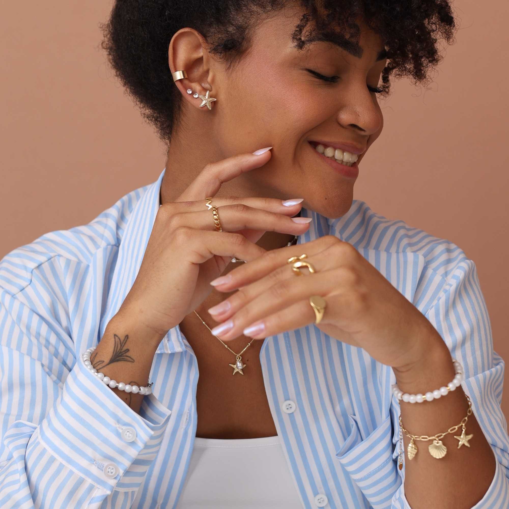 Brinco Folheado a Ouro 18k Estrela do Mar Texturada M Dourado 5