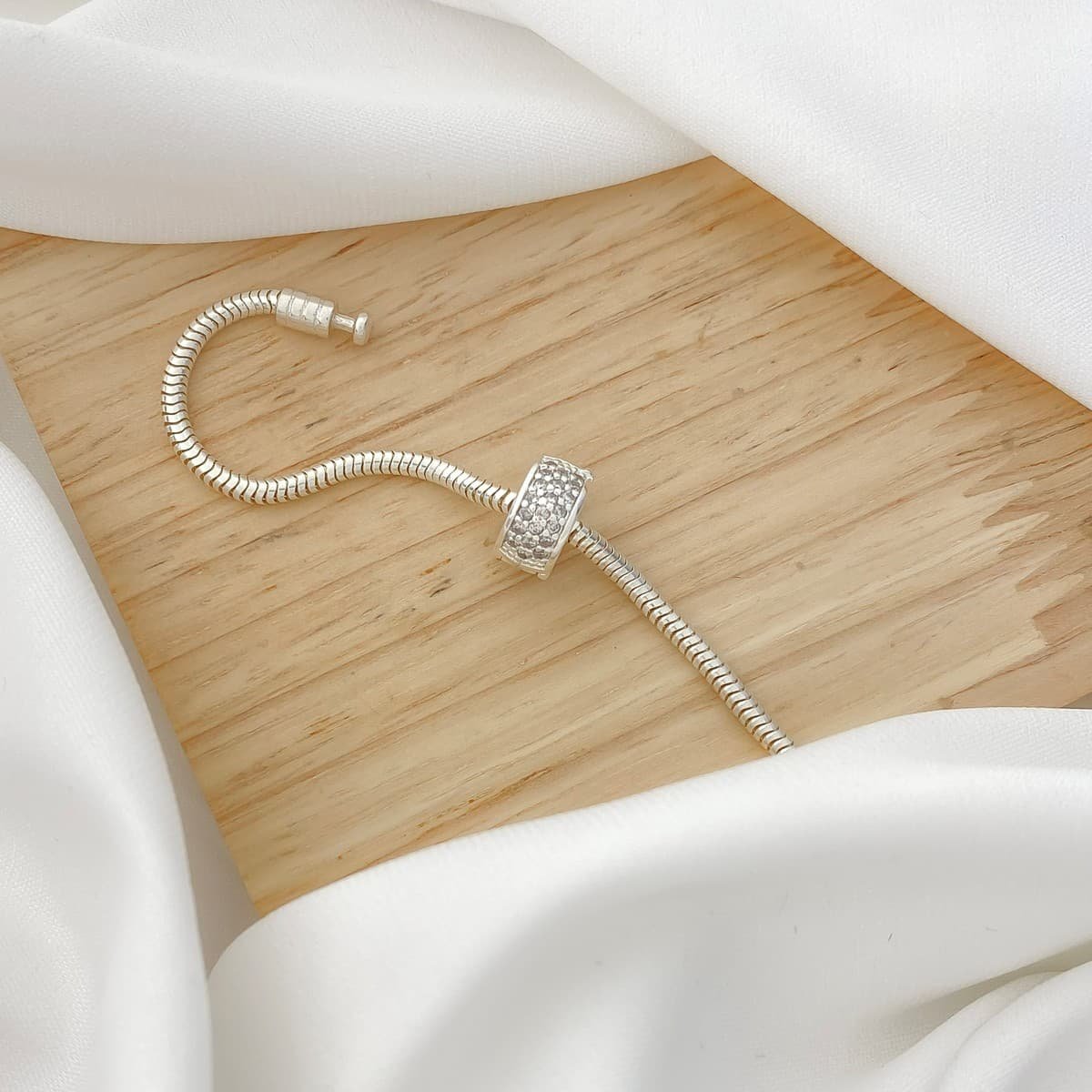 Trava de Segurança Zircônias Brancas Prata 2