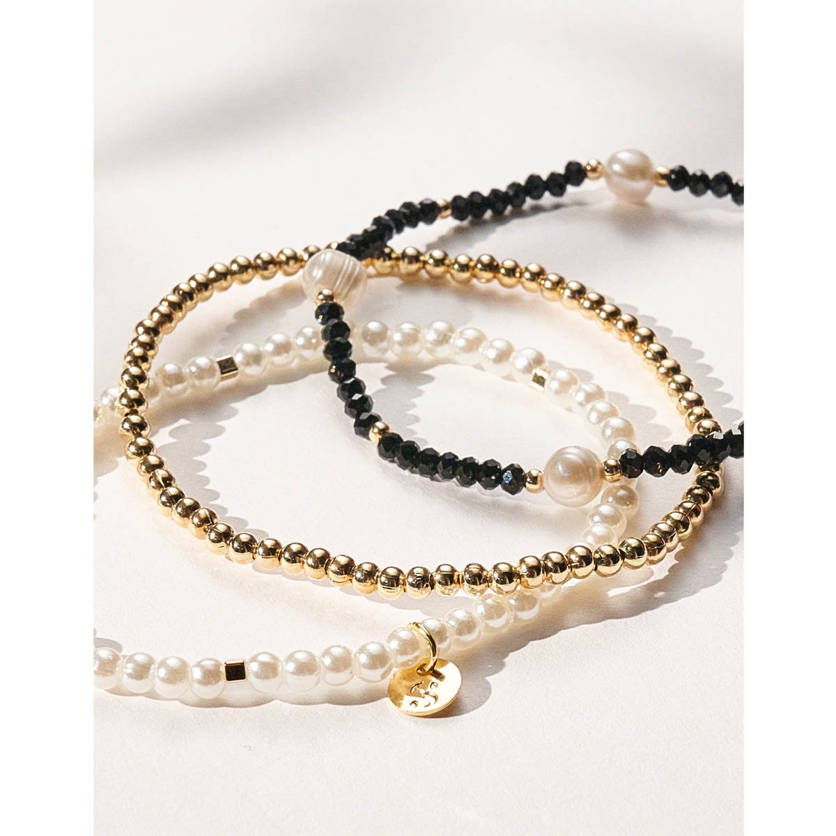 Kit com 3 Pulseiras Cristais Pretos + Pérola Multicores 3